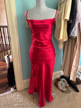 Red maxi dress with slit and button detailing